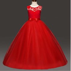 a red flower girl dress on a mannequin