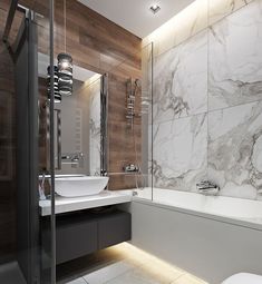 a modern bathroom with marble walls and flooring