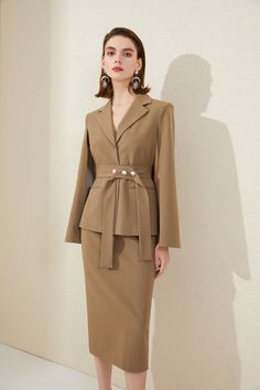 Chocolate Brown Cape Sleeve Blazer Skirt Suit Description: Peak lapels; front button blazer Structured shoulders. No pockets. Midi Skirt V-Neck, cape sleeves; buttons Structured shoulders. Chest welt pockets. Hip flap pockets Polyester 63% Viscose 33% Spandex 4% Imported Brand - Aision Model Number - 213203C3+S1 Luxury Beige Skirt Suit For Formal Occasions, Luxury Blazer Dress With Pressed Crease For Fall, Luxury Tailored Beige Skirt Suit, Luxury Brown Three-piece Suit For Work, Luxury Fitted Beige Skirt Suit, Luxury Brown Skirt Suit For Fall, Luxury Knee-length Office Blazer, Luxury Elegant Capelet For Workwear, Luxury Notch Lapel Skirt Suit For Fall