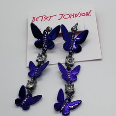 Betsey Johnson - Purple Butterfly Linear Earrings Sophisticated Linear Earrings Featuring Graduated Soft Lavender Butterflies Adorned With Minimal Stone Accents And Round Stone Gems. Earrings Have A Lever Back Closure. 3" Length 0.5"-0.75" Width Trendy Purple Metal Earrings, Elegant Purple Butterfly Earrings, Adjustable Purple Metal Earrings, Purple Metal Earrings, Trendy Lavender Jewelry For Party, Linear Earrings, Lavender Butterfly, Soft Lavender, Betsey Johnson Jewelry