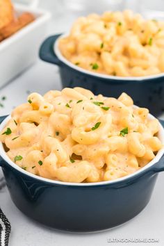 two bowls filled with macaroni and cheese