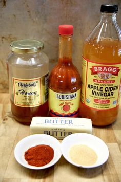 ingredients for apple cider vinegar on a wooden table