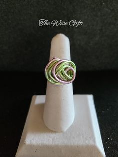 Hello & Welcome! In this listing you will find a very pretty, handcrafted aluminum wire wrapped ring. Size 7 Made using 16 gauge baby pink & lime green aluminum wire & lot's of love. It is non-adjustable & is true to size. You will receive the exact ring that is shown in the photos. Free gift wrapping is available. If you're sending the ring as a gift, please mark the gift option or leave me a note in the "notes" section during checkout. If you have any questions, feel free to send me a message & I'll be happy to assist you. Thanks for taking a look & have yourself a beautiful day!♥ Saint Ann, Wire Wrapped Ring, Wire Wrapped Rings, Wrap Rings, A Beautiful Day, Free Gift Wrapping, Rings Statement, Beautiful Day, Free Gift