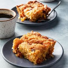 two plates with pieces of cake on them next to a cup of coffee