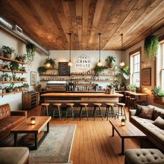 a room with wooden floors and lots of plants on the wall, along with couches