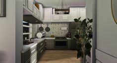 a narrow kitchen with white cabinets and wood flooring is seen through the doorway to another room