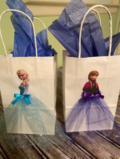 two bags with frozen princesses on them