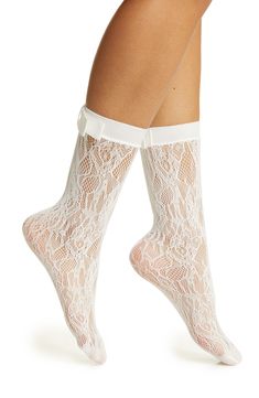 A neat bow decorates the back of delicate lace socks that were designed to make an elegant statement. Nylon/spandex Hand wash, dry flat Imported White Lace Socks With Heels, Lace Socks With Heels, White Lace Socks, Socks With Heels, Lace Socks, Crew Socks, White Lace, High Heel, Coco