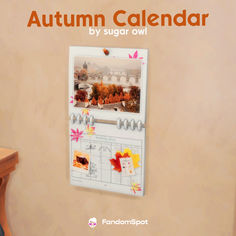 an autumn calendar hanging on the wall