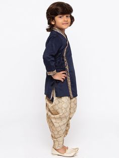 JBN CREATION Boys' Dark Blue Cotton Kurta and Dhoti Pant Set Enhance your little one's traditional wardrobe with the JBN CREATION Boys' Dark Blue Cotton Kurta and Dhoti Pant Set. Perfect for festive occasions, this stylish ensemble combines comfort and elegance. Features Elegant dark blue color Intricate embroidery on the kurta Comfortable fit with adjustable dhoti pants Specifications Brand: JBN CREATION Color: Dark Blue Size: Available in various sizes Fit: Regular fit Material & Care Material Cotton Bandhgala For Diwali With Traditional Drape, Diwali Cotton Bandhgala With Traditional Drape, Cotton Bandhgala For Diwali In Traditional Drape, Embroidered Blue Pant Set For Diwali, Blue Embroidered Pant Set For Diwali, Traditional Blue Sherwani For Navratri, Traditional Zari Work Pant Set, Blue Traditional Sherwani For Puja, Traditional Fitted Pant Set For Eid