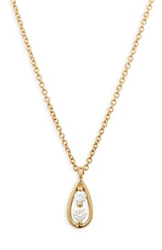 A duo of diamonds floats within an elegant pear-shaped pendant on a classic handcrafted necklace. 16" length; 2" extender Total diamond weight: 0.08ct. Color: G Clarity: VS 18k gold/diamond Imported >Diamond Guide Luxury Yellow Gold Teardrop Pendant Diamond Necklace, Formal Yellow Gold Teardrop Pendant Diamond Necklace, Classic 14k Gold Teardrop Pendant Diamond Necklace, Classic 14k Gold Teardrop Diamond Necklace, Fine Jewelry Yellow Gold Teardrop Diamond Necklace, Teardrop Yellow Gold Diamond Necklace For Gift, Luxury Pear-shaped Yellow Gold Diamond Necklace, Yellow Gold Pear-shaped Necklace With Single Cut Diamonds, Anniversary Diamond Teardrop Pendant Necklace