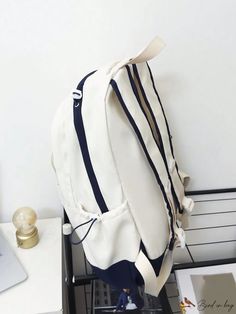 BirdinBag - Chic Beige Letter Patch Backpack with Front Zipper - Perfect for School Beige Backpack With Zipper Closure For Study, White Backpack With Zipper Closure For Students, White Backpack With Zipper Closure, White Backpack With Zipper Closure For Study, Functional Beige Bag For Students, Functional Cream Backpack, Cream Backpack With Zipper For Back To School, Cream Backpack For School, Cream Backpack With Zipper Closure For Back To School