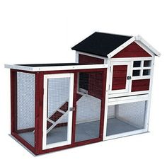 a red and white chicken coop with a black roof