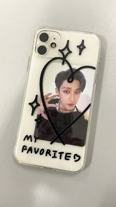 a cell phone case with an image of a person in a heart and stars on it