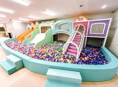 an indoor play area with lots of balls