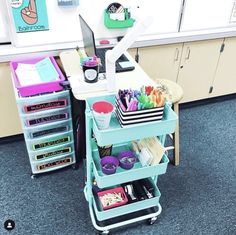 a desk with lots of drawers on top of it