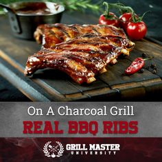 ribs on a cutting board with tomatoes and sauces in the background text reads on a charcoal grill real bbq ribs grill master university