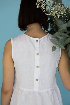 "MsWrinkle's clothing - from human to human. 100% handmade. *Description* - Sleeveless smock/maternity dress with pockets and buttons on back ; - High quality European linen; - Washed and softened (doesn't shrink anymore); - Medium weight linen (150 g/m2); - Our linen is OEKO-TEX certified that meets human ecological safety requirements; - Model is wearing size S in white color (other sizes and colors please choose on the right); - Slightly transparent; - Not ironed and we suggest to use tumble Sleeveless Linen Dress With Button Closure, Summer Linen Button Dress, Summer Linen Dress With Buttons, Sleeveless Cotton Dress With Button Back, Sleeveless Linen Dress With Buttons For Beach, White Linen Button Dress For The Beach, Beach Linen Dress With Buttons, White Linen Dress With Buttons For The Beach, Summer Linen Daywear Dress With Buttons