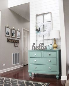 an image of a dresser in the living room