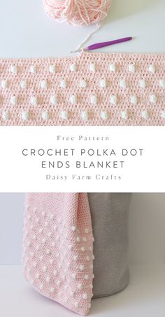 crochet polka dot ends blanket with yarn and knitting needles on the table next to it