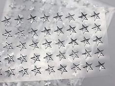 an american flag made out of silver stars