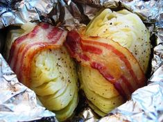 two pieces of bacon and cabbage wrapped in foil