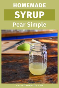 gold colored pear syrup in mason jar on wooden table Pear Simple Syrup Recipe, Pear Syrup Recipe, Pear Simple Syrup, What Is Simple Syrup, Pear Syrup, One Skillet Chicken, Winter Cocktails Recipes, Easy Alcoholic Drinks