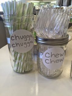 several jars filled with different types of food