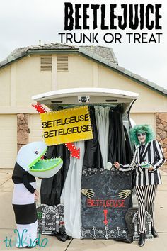 two clowns dressed as beetlejuice and the one in costume is holding a sign