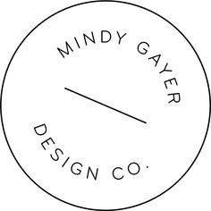 the logo for mindy gayer design co, which is designed in black and white