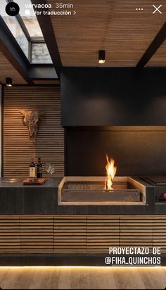 a fire pit in the middle of a room