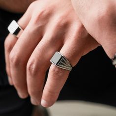 Pictured here is our vintage signet ring in silver & black. Perfect when worn on it's own or with other pieces of jewelry, this ring has become a staple in both men's jewelry and in men's fashion. Follow and check us out for more! Modern Adjustable Rings For Everyday, Classic Adjustable Stainless Steel Signet Ring, Sleek Ring Jewelry Gift, Sleek Ring Jewelry For Gift, Black Minimalist Signet Ring For Everyday, Modern Adjustable Engraved Metal Ring, Modern Adjustable Engraved Ring, Minimalist Black Engraved Promise Ring, Classic Black Adjustable Signet Ring