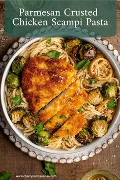 chicken scampi pasta with parmesan crust in a white bowl