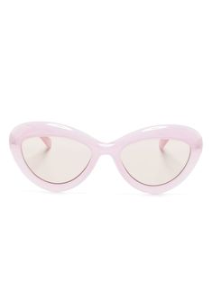 light pink acetate/acrylic translucent design cat-eye frame tinted lenses logo-embossed arm straight arms curved tips These glasses come with a protective case. Retro Pink Cat Eye Sunglasses With Tinted Lenses, Classic Cat Eye Sunglasses With Mirrored Lenses For Spring, Spring Classic Cat Eye Sunglasses With Mirrored Lenses, Retro Pink Cat Eye Sunglasses With Polarized Lenses, Retro Pink Polarized Cat Eye Sunglasses, Classic Pink Sunglasses With Mirrored Lenses, Pink Cat Eye Sunglasses With Uv Protection, Pink Cat Eye Sunglasses For Spring, Spring Acetate Sunglasses With Mirrored Lenses