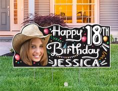 a happy 18th birthday sign with a woman's face on it in front of a house