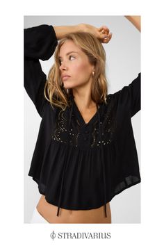 Flowing blouse with a V-neckline with matching covered buttons and adjustable drawstring ties. Featuring long sleeves with elasticated trims. Cutwork embroidery on the front. No lining. Available in assorted colours. Long Sleeve Blouse Outfit, Flowing Blouse, Stockholm Fashion, Embroidery Blouse, Blouse Outfit, Outfit Goals, Blouse Black, Embroidered Blouse, Cute Tops