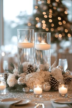 a table with candles and flowers on it