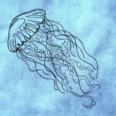 a drawing of a jellyfish on a blue towel