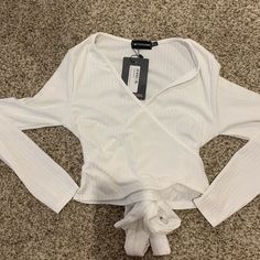 Brand New Cream Rib Long Sleeve Wrap Top. Casual Wrap Crop Top For Fall, Trendy Spring Wrap Crop Top, Trendy Wrap Crop Top For Spring, Casual White Wrap Top, Casual Wrap Crop Top For Day Out, Trendy Wrap Top For Day Out, White Crop Top For Fall Day Out, Casual Wrap Tops For Night Out, White Wrap Tops For Brunch