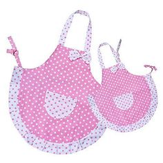 two pink and white polka dot bibs