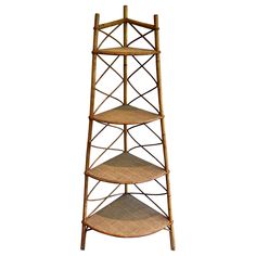 a three tier bamboo shelf with wicker shelves