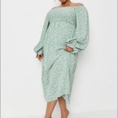 This Is Brand New With Tags And Has Never Been Worn Green Long Sleeve Dress With Smocked Cuffs, Casual Billowy Floral Print Dress, Flowy Smock Midi Dress For Daywear, Smocked Long-sleeve Vacation Dress, Long Sleeve Smock Dress For Vacation, Billowy Long Sleeve Midi Dress With Smocked Back, Smocked Sundress Midi Length, Knee-length Smocked Sundress, Knee-length Smock Sundress