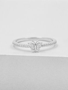 Butterflies have so many meanings. Some personal, some superstitious. You may just even like butterflies. Whatever it may be, we know this butterfly ring is perfect for you! We can't get enough of butterflies. This cute and tiny 5mm Cubic zirconia butterfly lies on a 1.3mm rhodium plated band. Please read my shop policies to learn more about the composition and proper care for each item purchased. All plated jewelry from our shop are eligible for our jewelry restoration program. For more informa Silver Butterfly Ring, Cute Promise Rings, Ring Butterfly, Tiny Butterfly, Charm Ring, Friendship Rings, Butterfly Ring, Silver Butterfly, Charm Rings