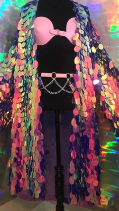 Want to feel like a celestial KWEEN?? Yaaaaas? Than you need this sparkly kimono honey. Perfect for pool parties, nights out, or music festival! Made to order with love. Lining optional. Please list fabric color in comment box at checkout. Top and belt available on website! Please advise, paillete sequins are at high risk of fallout. Must be worn with care. Sequins may fall out if tugged on or worn roughly. Please allow 1-2 weeks to process. Metallic Disco Outerwear For Party, Sequin Outerwear For Party And Festival, Sequin Outerwear For Party Season And Festivals, Disco Sequin Party Outerwear, Disco Party Outerwear With Sequins, Sequin Disco Outerwear For Party, Disco Sequined Outerwear For Party, Winter Festival Sequined Outerwear, Party Multicolor Sequined Outerwear