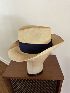 For your consideration Original vintage 1950s era Stetson Imperial Genuine Panama straw fedora hat from Cobb's Department Stores ~ Lubbock Texas Embossed John B Stetson / Imperial Stetson / Genuine Panama Original Cobb's Dept Store sticker Wide headband .. dark blue .. silk? Brown leather sweatband Marked size 7 1/8 Color: Natural Made in USA This hat appears to be in nice shape .. shows minor age / soiling spotting .. minor separation in straw on brim front left side .. sweatband is supple .. b Stetson Straw Cowboy Hat, 50s Picnic, Texas Lone Star, Cowboy Vintage, Hat Fedora, Lubbock Texas, Beach Cabana, Straw Fedora Hat, Straw Fedora