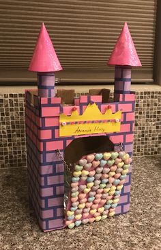 a castle made out of candy is sitting on the counter