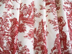 a red and white toiler print curtain