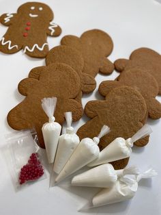 gingerbread cutouts and candy bags on a table