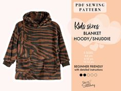 a brown and black zebra print hoodie with the words kids sizes blanket hoody snuddle