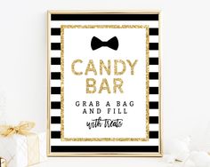 a black and white striped poster with gold glitter text reads candy bar grab a bag and fill with treats